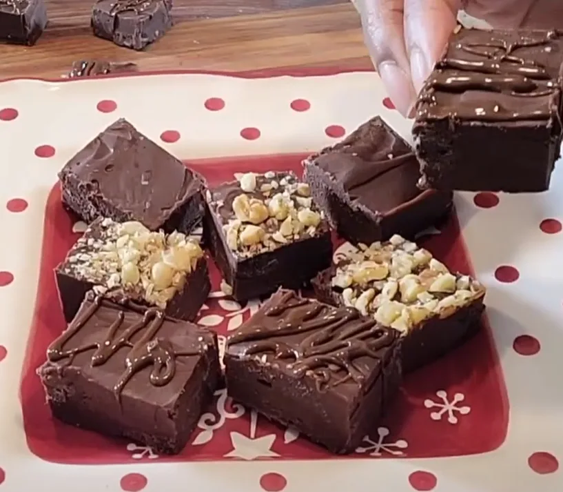 Assortment of delicious keto chocolate fudge squares, some with nuts.