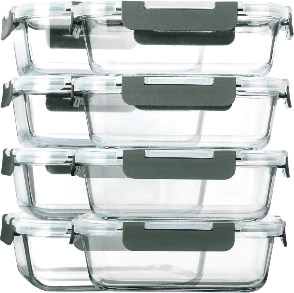 Stack of four glass food storage containers with gray lids